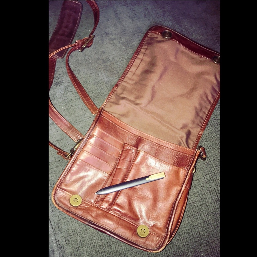 Brown purse with pen & long strap